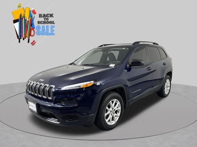 2016 Jeep Cherokee Sport in True Blue Pearlcoat — front three-quarter view