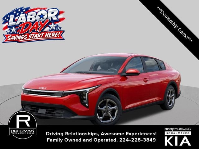 2026 Kia K4 LXS in Currant Red — front three-quarter view