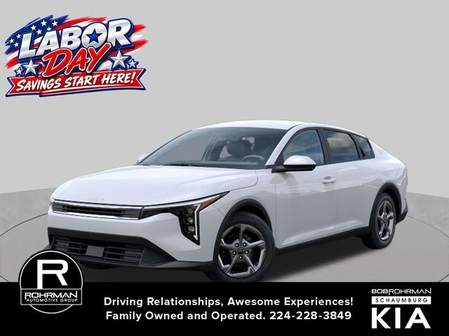 2026 Kia K4 LXS in Snow White Pearl — front three-quarter view