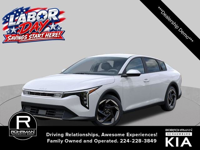 2026 Kia K4 EX in Snow White Pearl — front three-quarter view