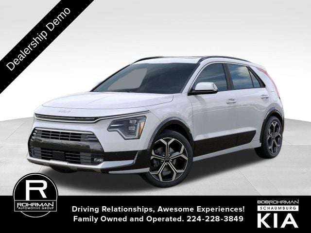 2025 Kia Niro SX Touring in Snow White Pearl — front three-quarter view