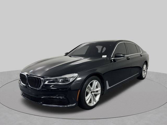 2016 BMW 7 Series 750i xDrive in Black Sapphire Metallic — front three-quarter view
